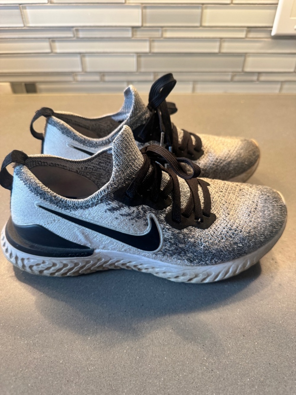 Nike women’s flyknit tennis shoes, size 7